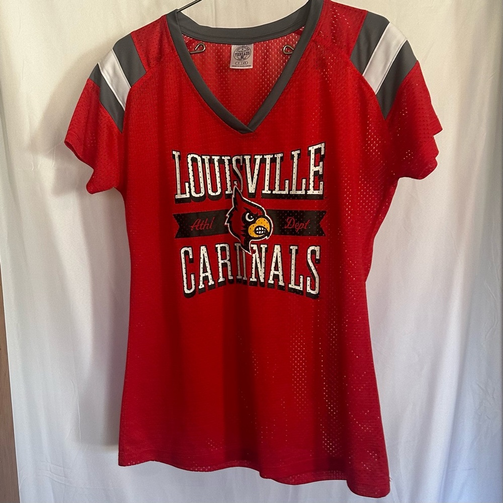 Women’s UofL jersey. Size S